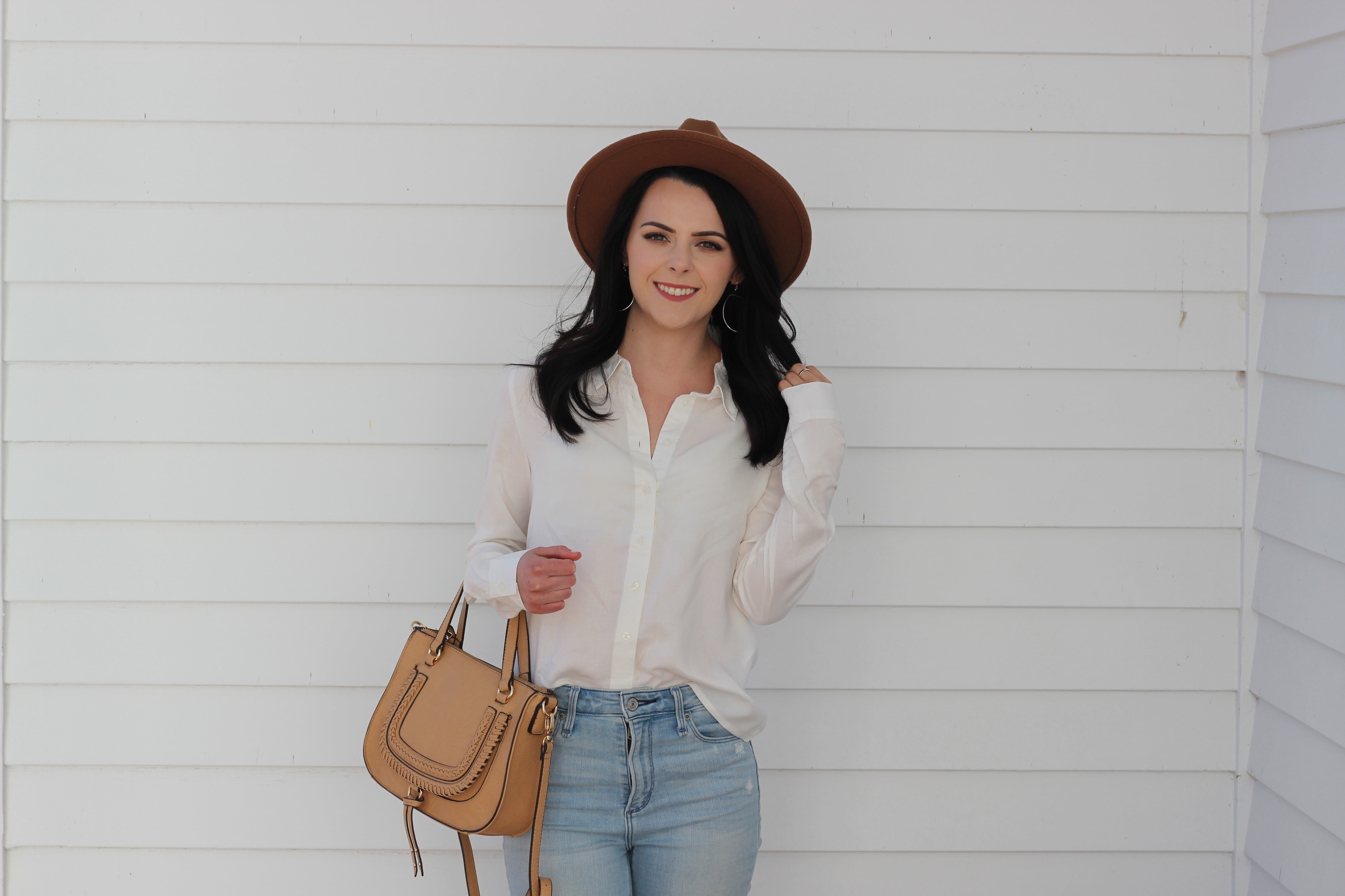 white button down shirt and jeans